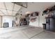 A clean and organized two car garage, offering both parking and storage solutions at 23 Crescent Palm Ct, Henderson, NV 89002