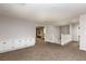 Expansive open loft area with plush carpeting and built in storage at 23 Crescent Palm Ct, Henderson, NV 89002