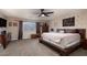 Expansive bedroom with ample natural light, and a king bed at 23 Crescent Palm Ct, Henderson, NV 89002