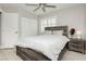 Inviting bedroom featuring a comfortable bed, natural light, and closet space at 2345 Cliffwood Dr, Henderson, NV 89074