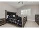 Comfortable bedroom features a stylish bed, lots of natural light, and closet space at 2345 Cliffwood Dr, Henderson, NV 89074