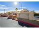 Heartland Hills community entrance with rock landscaping and a clear blue sky at 2345 Cliffwood Dr, Henderson, NV 89074