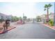 Gated community entrance featuring desert landscaping and a clear blue sky at 2345 Cliffwood Dr, Henderson, NV 89074