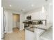 Kitchen with granite counters, stainless appliances and breakfast bar seating at 2345 Cliffwood Dr, Henderson, NV 89074