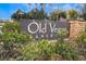 Community sign for Old Vegas Ranch, surrounded by desert landscaping at 2407 Belt Buckley Dr, Henderson, NV 89002