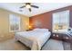 Cozy bedroom features a ceiling fan, large window, and a comfortable queen bed at 25 Lone Cove Ct # 2, Henderson, NV 89012