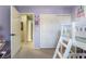 Charming bedroom with white bunk beds, purple walls and closet with sliding doors at 25 Lone Cove Ct # 2, Henderson, NV 89012