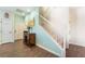 Bright entryway featuring wood floors and staircase at 25 Lone Cove Ct # 2, Henderson, NV 89012