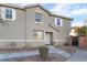 View of front exterior of a two-story townhouse at 25 Lone Cove Ct # 2, Henderson, NV 89012