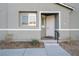 Close up view of a white front door at 25 Lone Cove Ct # 2, Henderson, NV 89012