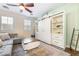 Inviting living room features sliding door and a ceiling fan at 25 Lone Cove Ct # 2, Henderson, NV 89012