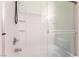 Bathroom shower features glass doors and tile surround at 25 Lone Cove Ct # 2, Henderson, NV 89012