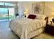 Cozy main bedroom with a comfortable bed and serene outdoor views at 2536 Faiss Dr, Las Vegas, NV 89134