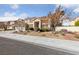 Beautiful home exterior featuring a well-maintained yard and multiple car garage at 2637 Ohio Ct, Las Vegas, NV 89128
