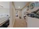 Hallway showcasing multiple bedrooms and artistic decorations at 2637 Ohio Ct, Las Vegas, NV 89128