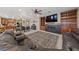 Open-concept layout featuring a living room connected to the kitchen and dining area at 2637 Ohio Ct, Las Vegas, NV 89128