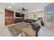 Spacious living room with plush seating, fireplace, and built-in shelving at 2637 Ohio Ct, Las Vegas, NV 89128