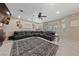Spacious living room with cozy seating arrangement, a ceiling fan, and ample natural light at 2637 Ohio Ct, Las Vegas, NV 89128
