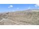 Stunning aerial view of the property and its picturesque location nestled in the desert landscape at 26425 Park St, Nelson, NV 89005