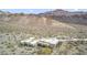 Desert home aerial showcases architectural design and desert landscape at 26425 Park St, Nelson, NV 89005