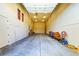 This is a spacious garage with a large garage door and plenty of room for parking and storage at 26425 Park St, Nelson, NV 89005
