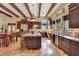 Gourmet kitchen with stainless steel appliances, granite countertops, and central island at 26425 Park St, Nelson, NV 89005