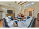 Comfortable living room with a large sofa and view of entryway at 26425 Park St, Nelson, NV 89005
