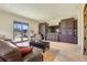 Spacious living room featuring custom built-ins and desert views at 26425 Park St, Nelson, NV 89005