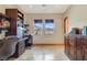 This office features custom dark wood desk and cabinets and a beautiful view of the desert landscape at 26425 Park St, Nelson, NV 89005