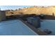 Flat rooftop with HVAC system and satellite dish and mountain view at 26425 Park St, Nelson, NV 89005