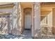 Charming home entrance with a decorative security door and covered porch at 2724 Rosarito St, Las Vegas, NV 89108