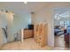 Upstairs hallway featuring custom storage and a view into the adjacent bedroom at 2724 Rosarito St, Las Vegas, NV 89108