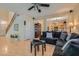 Spacious living room with hardwood floors, a large sectional sofa, and an open floor plan at 2724 Rosarito St, Las Vegas, NV 89108
