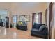 Bright living room featuring a soaring ceiling, hardwood floors, and plenty of natural light at 2724 Rosarito St, Las Vegas, NV 89108
