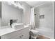 Bathroom with modern fixtures, a large mirror, and a shower-tub combination at 3062 Tarpon Dr # 201, Las Vegas, NV 89120