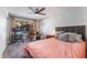 Bedroom with ceiling fan and natural light at 3062 Tarpon Dr # 201, Las Vegas, NV 89120