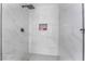 Modern tiled shower with rainfall shower head and built in shelf at 3062 Tarpon Dr # 201, Las Vegas, NV 89120