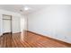 Bedroom has a ceiling fan, white walls, and a closet at 4411 Elk Point Cir, Las Vegas, NV 89147