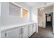 Hallway featuring built in storage and views of nearby rooms at 4411 Elk Point Cir, Las Vegas, NV 89147