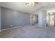 Main bedroom with vaulted ceilings, plush carpeting, and closet at 4411 Elk Point Cir, Las Vegas, NV 89147