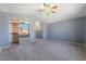 Main bedroom offers vaulted ceiling, plush carpet and mirror closet doors at 4411 Elk Point Cir, Las Vegas, NV 89147