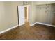 Bedroom with tiled floors, walk-in closet and neutral paint at 4791 E Craig Rd, Las Vegas, NV 89115