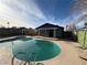 Backyard featuring an in-ground swimming pool, covered patio, and a fenced in yard at 5194 Saratoga Dr, Las Vegas, NV 89120