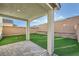 Covered patio featuring tiled flooring and view of backyard landscaping at 5399 El Nevero St, Las Vegas, NV 89166