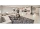 Open-concept living space that flows into the kitchen, creating a bright and inviting atmosphere at 5399 El Nevero St, Las Vegas, NV 89166