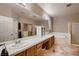 Large bathroom features double sinks, a vanity, a soaking tub, and a separate shower area at 5416 Irish Spring St, Las Vegas, NV 89149