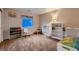 Bright ' bedroom with carpeted floors, a window for natural light, and ample storage solutions at 5416 Irish Spring St, Las Vegas, NV 89149