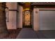 Close-up of the decorative wrought iron gate leading to the front door, adding a touch of elegance to the entrance at 5416 Irish Spring St, Las Vegas, NV 89149