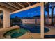 Relaxing pool and spa with covered patio and privacy fence create a backyard oasis for entertaining at 5416 Irish Spring St, Las Vegas, NV 89149