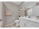 Bright bathroom with a large mirror, fresh plants, and elegant towel arrangement at 56 Lomita Heights Dr, Las Vegas, NV 89138